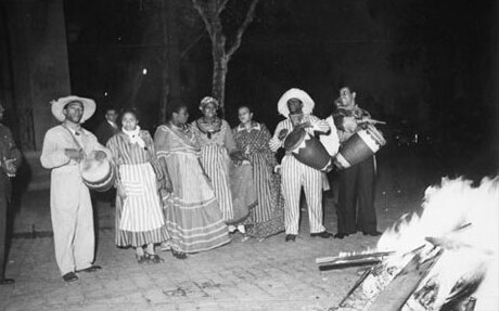 Afro-Argentines playing candombe near a Saint John bonfire in 1938.
